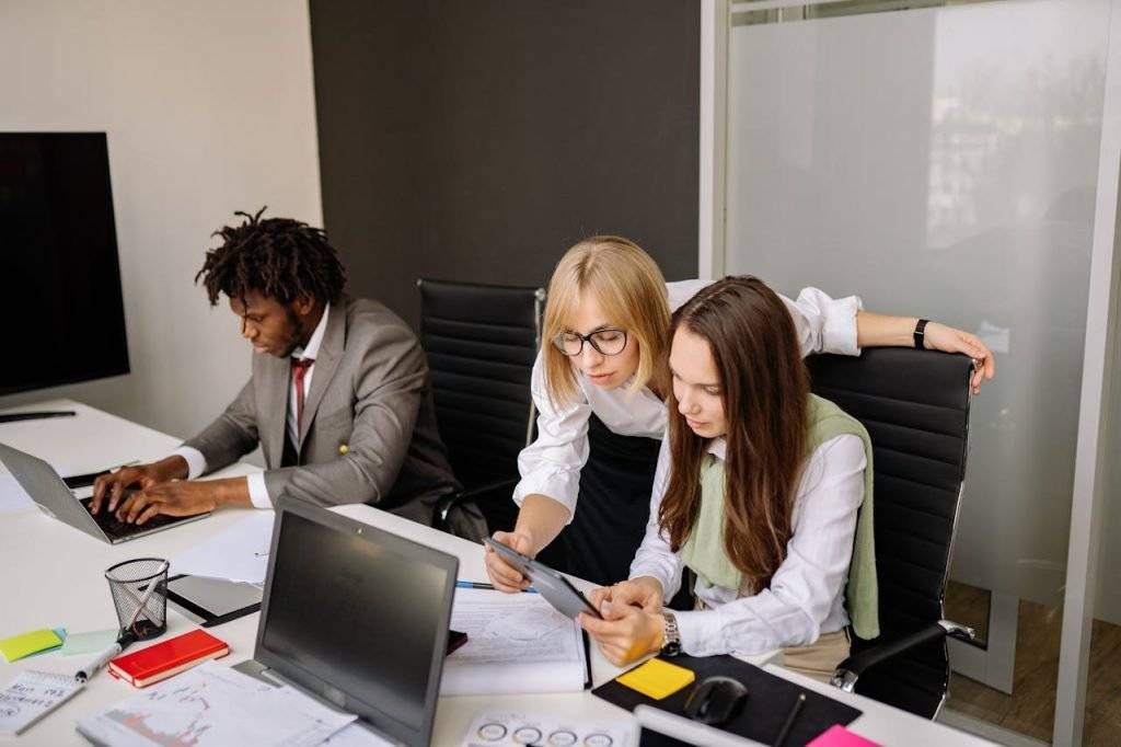 Employees Busy Working Inside an Office